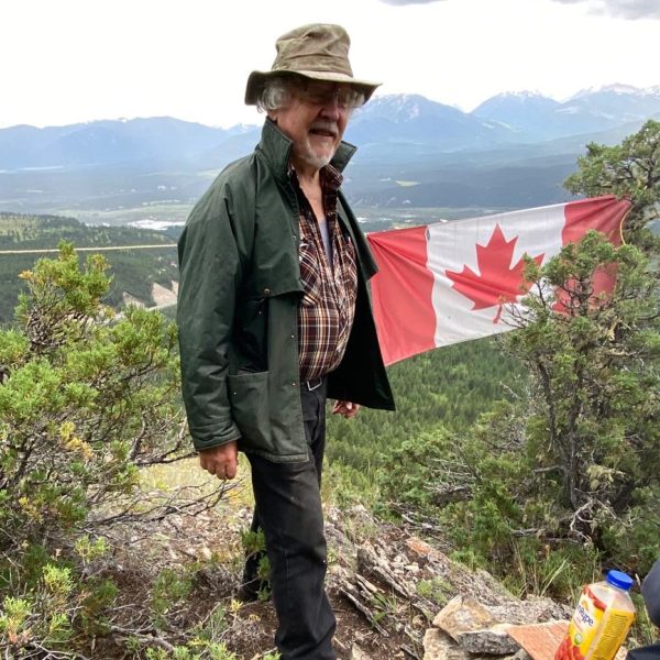 Flying the Maple Leaf from a mountain on Canada Day